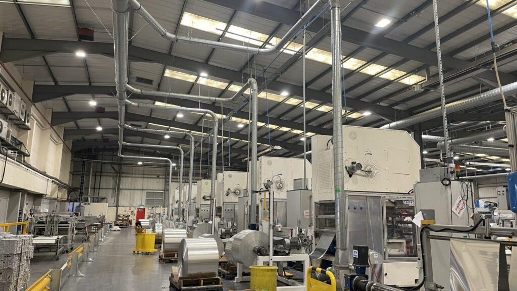 Aluminium foil lattice removal from food tray production process