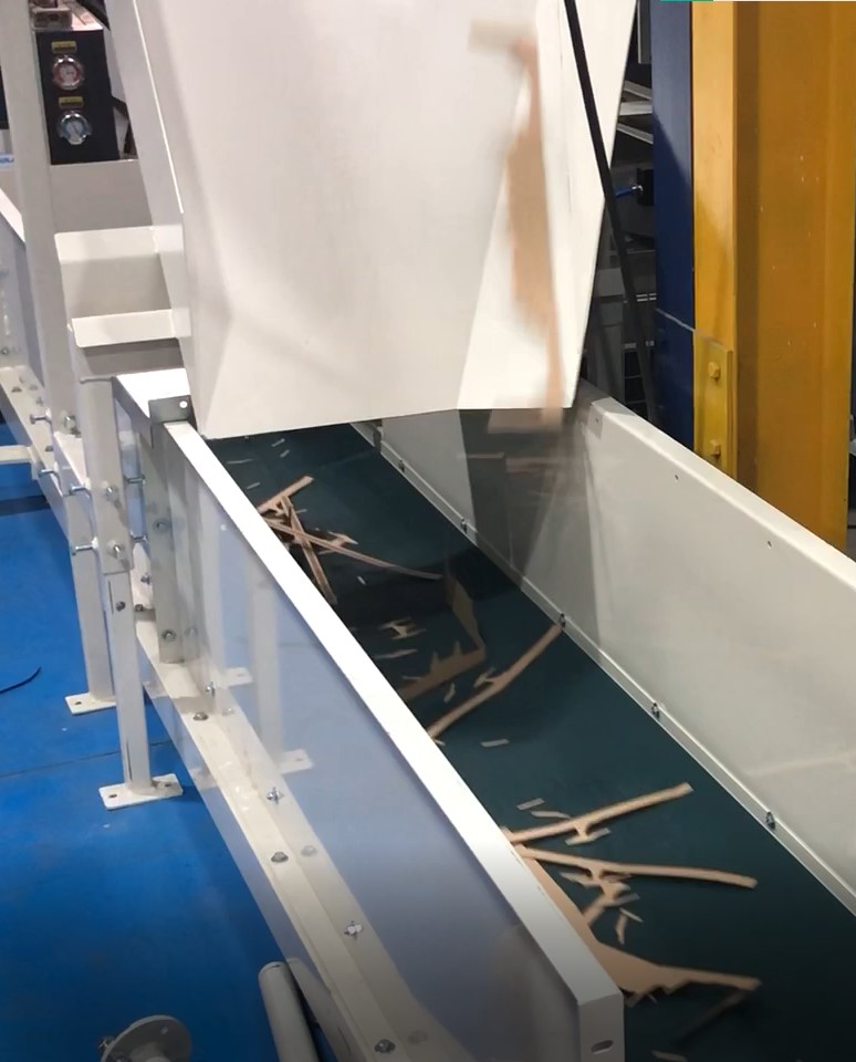 Corrugated Board Trim Extraction System Corrugated Board Trim Extraction System